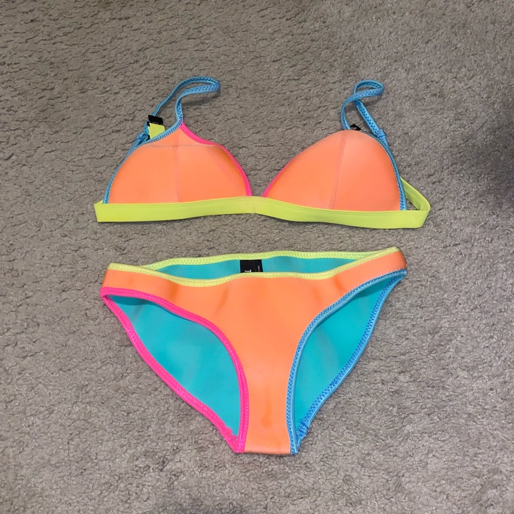 Orange neoprene triangl bikini. Worn a few times.